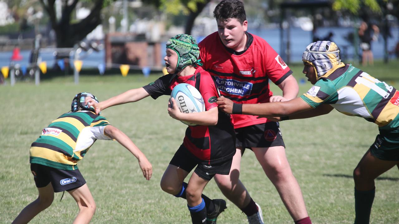 King of the Country U/13 Rugby Union tournament at Overall park Southport. Surfers Paradise(Yellow Green ) V Far North Coast (red black). Picture Glenn Hampson