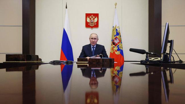 Vladimir Putin chairs a meeting on the economy via a video link at the Novo-Ogaryovo state residence outside Moscow this week. Picture: AFP