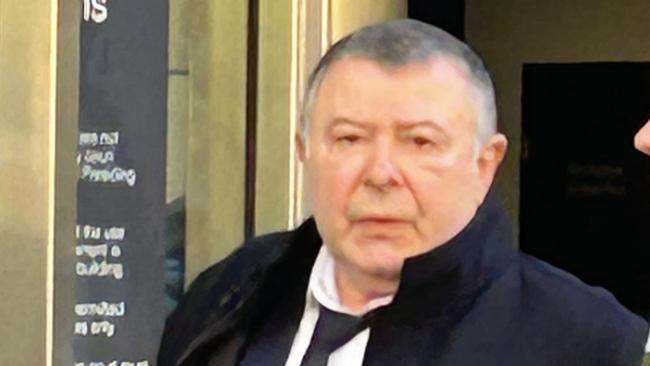 Melbourne massage therapist Anatoly Kitayevich leaves County Court after a plea hearing.