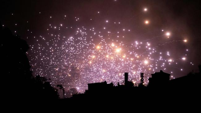 Sparks fly at the site of an Israeli airstrike on the outskirts of the southern Lebanese village of Zawtar. Picture: AFP