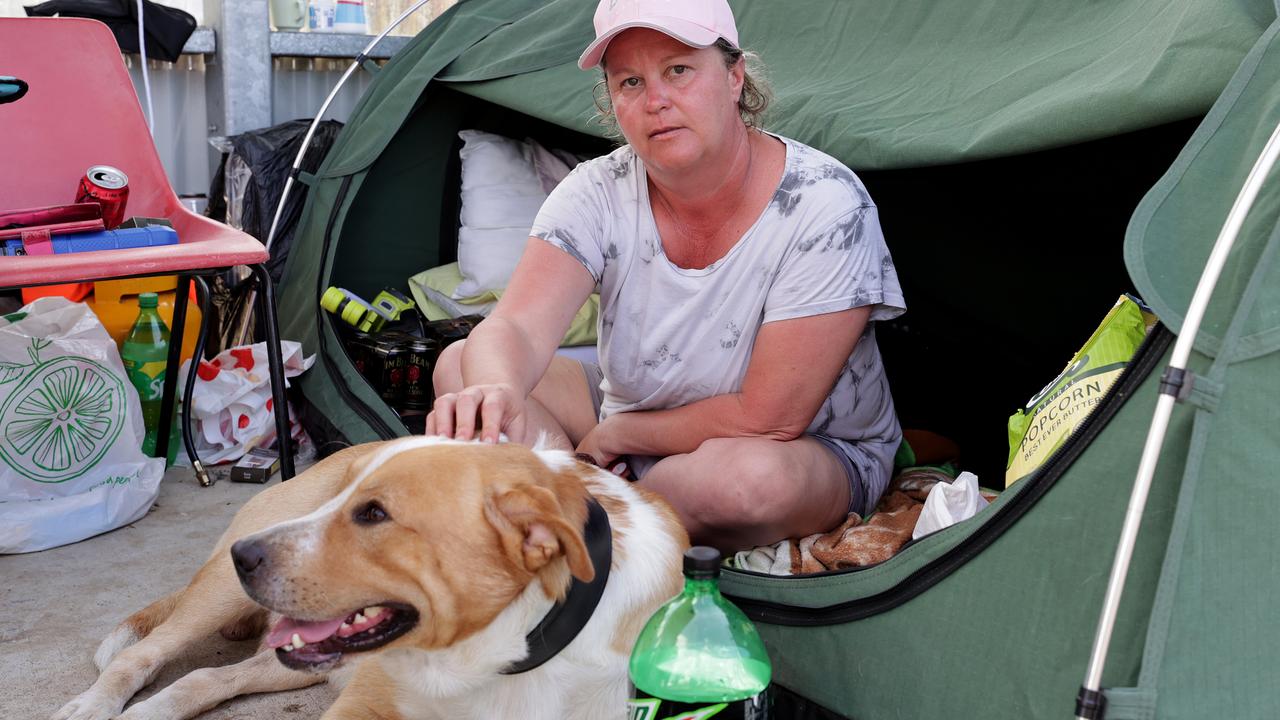 Coraki local Linda Hawke and dog Bill have been sleeping in a tent underneath the bus shelter in Coraki for the last week. Picture: Toby Zerna