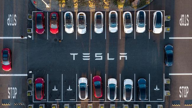 Tesla is expanding production capacity to meet demand, adding new factories as it tries to maintain growth in deliveries by an average of 50%. Picture: AFP