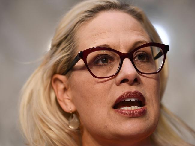 (FILES) In this file photo taken on March 27, 2019, US Senator Kyrsten Sinema speaks during an Aviation and Space Subcommittee hearing in Washington, DC. - Arizona Senator Kyrsten Sinema told US media on December 9, 2022, that she plans to leave the Democratic Party and register as an independent. The Democrats secured a 51-49 majority in the chamber following Raphael Warnock's victory this week in the Georgia run-off election. But Sinema's move would reduce that to 50, with Vice President Kamala Harris serving as a tie-breaker for the Democrats. (Photo by Brendan Smialowski / AFP)