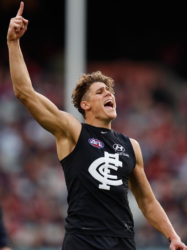 Charlie Curnow celebrates kicking a goal.