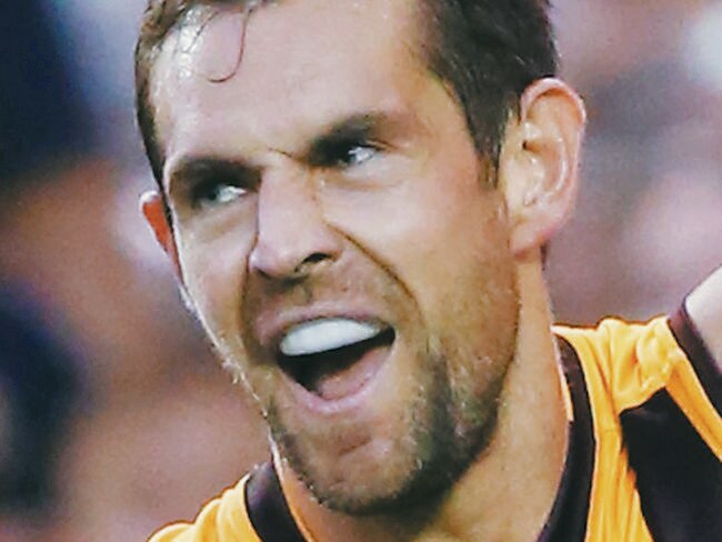 MELBOURNE, AUSTRALIA - MARCH 12: Luke Hodge of the Hawks celebrates a goal during the NAB CHallenge AFL match between the Hawthorn Hawks and the North Melbourne Kangaroos at Etihad Stadium on March 12, 2016 in Melbourne, Australia. (Photo by Michael Dodge/Getty Images)