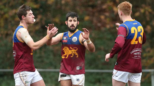 NFL: Alex Colaidis celebrates a goal with South Morang teammates. Picture: Hamish Blair