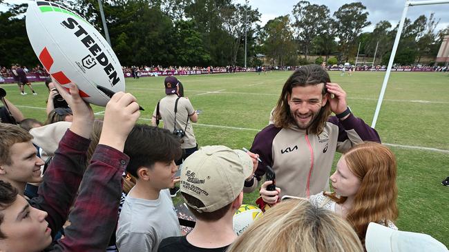 25/9/2023: Patrick Carrigan signs autographs and during selfies the fans during a Broncos fan training session at the Red Hill, Brisbane. pic: Lyndon Mechielsen/Courier Mail