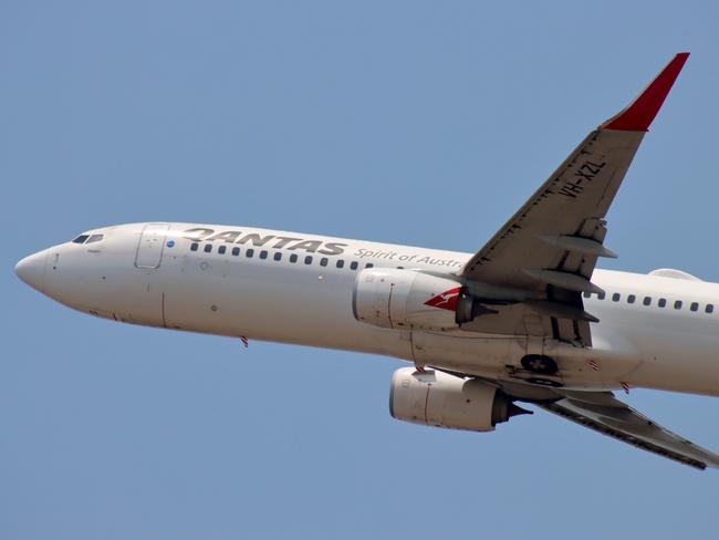 QANTAS plane departing from Brisbane Airport Pictures David Clark Photography