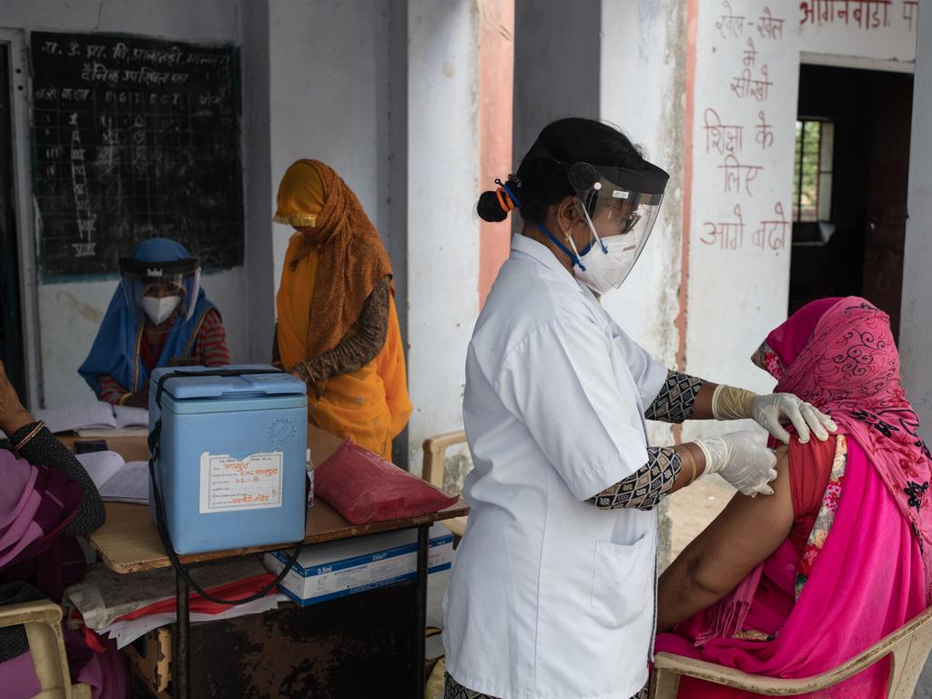 People receive a COVID-19 jab in India as a devastating wave of COVID-19 infections grip the nation and overwhelmed health systems. Picture: Rebecca Conway/Getty Images