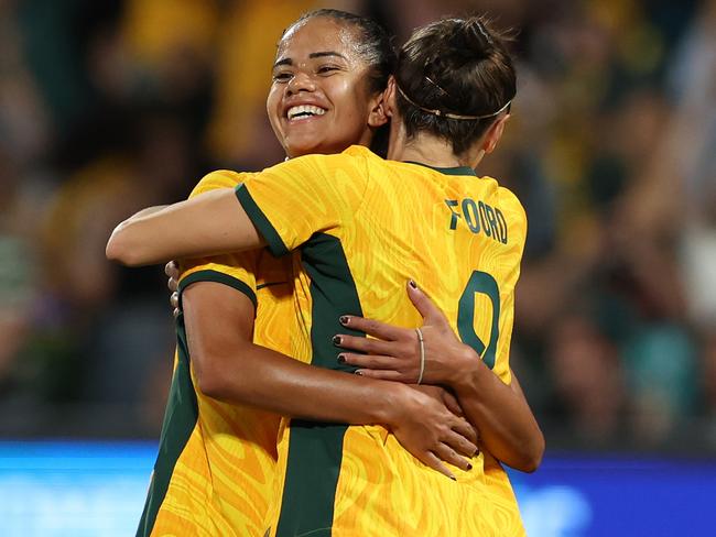 PERTH, AUSTRALIA - NOVEMBER 01: Mary Fowler of the Matildas celebrates with team mates after scoring a goal during the AFC Women's Asian Olympic Qualifier match between Australia and Chinese Taipei at HBF Park on November 1, 2023 in Perth, Australia. (Photo by Will Russell/Getty Images)