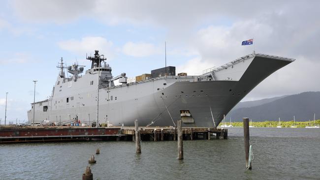 The HMAS Adelaide, a Royal Australian Navy Canberra-class landing helicopter dock ship, moored at the Cairns Wharf. Picture: Brendan Radke