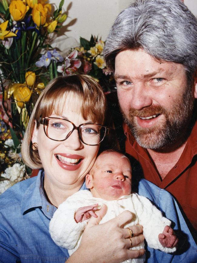 Channel 7 newsreader Jane Doyle and husband Ian with their newborn baby son Henry in 1995