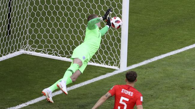 England goalkeeper Jordan Pickford dives to make a cracking save during the quarter final against Sweden. Picture: AP