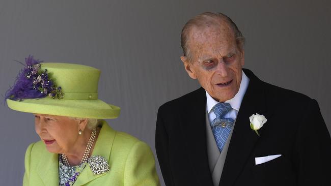 Queen Elizabeth and Prince Philip arrive at the wedding.