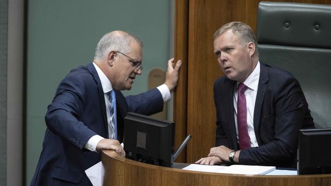 Scott Morrison has a quiet word with Speaker Tony Smith during question time in parliament on Wednesday. Picture: Gary Ramage