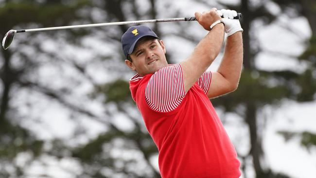 Patrick Reed of the United States team plays a shot during Thursday four-ball matches on day one of the 2019 Presidents Cup golf tournament at the Royal Melbourne Golf Club in Melbourne, Thursday, December 12, 2019. (AAP Image/Scott Barbour) NO ARCHIVING, EDITORIAL USE ONLY