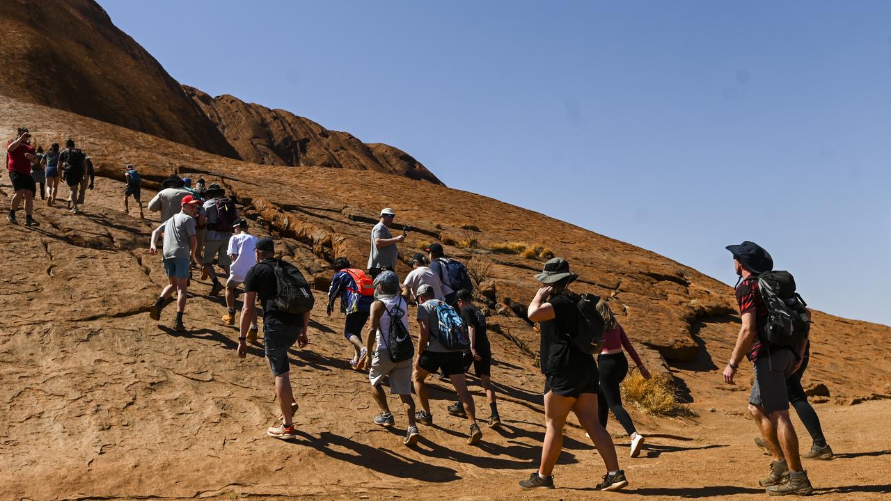 Traditional owners have asked tourists not to climb for years. Tourists are seen climbing Uluru, also known as Ayers Rock at Uluru-Kata Tjuta National Park in the Northern Territory, Friday, October 25, 2019. Picture: Lukas Coch/AAP