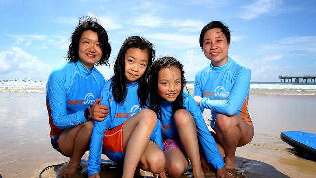 Chinese Tourists on the Gold Coast with Get Wet Surf School. Pics Adam Head