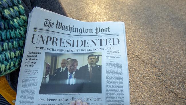 The US has slipped in the world corruption rankings in response to Donald Trump’s leadership. Here is a fake edition of the Washington Post that was released to the public earlier this month, calling for the president’s impeachment. Picture: Getty 