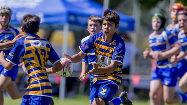 Day One of King of the Country rugby tournament at James Overell Park, Southport. possible. Sunshine Coast Invitational Barbarians U13s (Blue/yellow with ball) v USQ Saints U13s. Picture: Jerad Williams