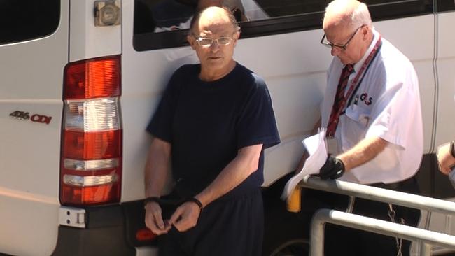 Domenic Perre being led into Adelaide Magistrates Court. Picture: 9News