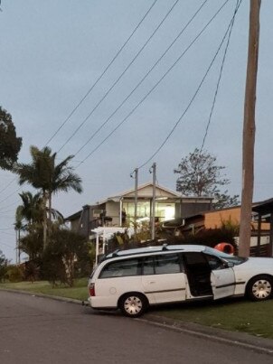 The vehicle when it crashed into the power pole at Bonnells Bay. Credit: NSW Police