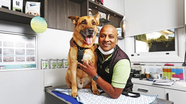 Owner of The Dog Clinic, Dr Raj Wicks with 9-year-old Shepherd cross. Picture: Zak Simmonds