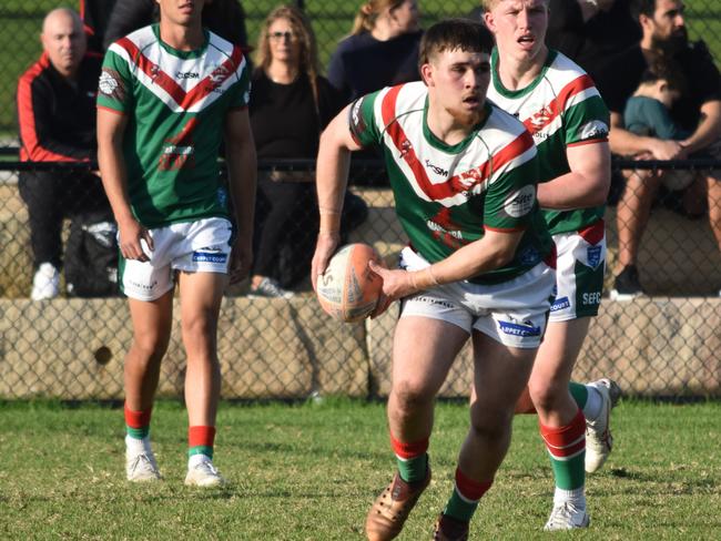 Aaron Kurnoth looks to pass to a teammate. Picture: Sean Teuma/NewsLocal