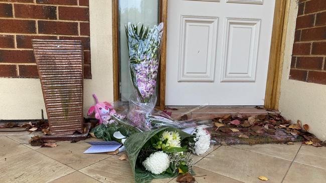 Flowers outside Ann Marie Smith’s house. Picture: Gabriel Polychronis,