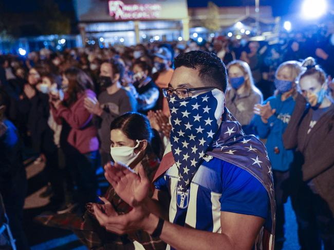 The crowd watches on as Joe Biden delivers his victory speech in Wilmington, Delaware. Picture: Angus Mordant