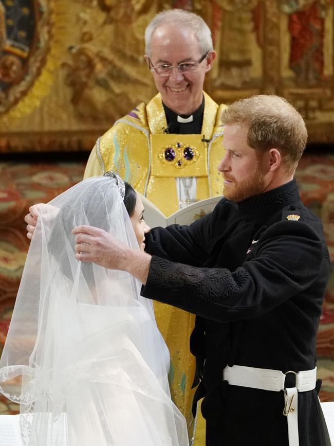 Lifting the Givenchy veil. Picture: Getty Images