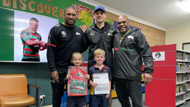 Yileen Gordon, Kyle Turner and Rhys Wesser with St Mary's Primary School students, Isobel Leonard and Harvey Sutcliffe on Friday. Picture: Aymon Bertah.