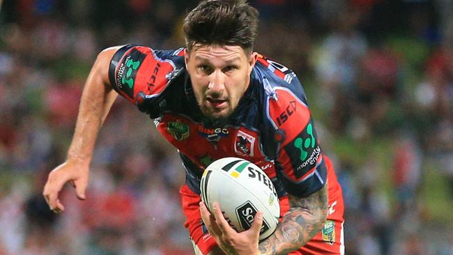 Gareth Widdop makes a break for the Dragons against the Warriors. Picture: Mark Evans