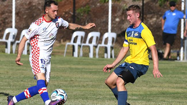 Gold Coast Knights player Nick Panetta looks to beat his opposite number. Picture: John Gass