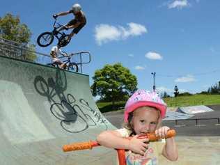 LEFT: Amelia Brian, 3, at Lismore Skate Park where she goes regularly to skate with her father. BELOW RIGHT: Jovana Wilmoth, Amelia Brian, 3 and Jemma Wilmoth, 7, with other local users of Lismore skate park. Picture: Jacklyn Wagner