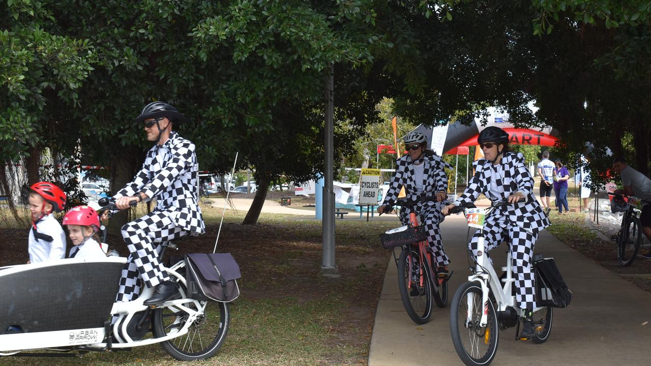 David Walters makes a dapper turn with Christie Walters and Amy Weller close behind at the River2Reef Ride. Picture: Tara Miko