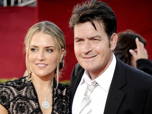 03/03/2011 WIRE: LOS ANGELES - FILE:  Actor Charlie Sheen (R) and Brooke Mueller arrive at the 61st Primetime Emmy Awards held at the Nokia Theatre on September 20, 2009 in Los Angeles, California.  Police remove Charlie Sheen and Brooke Mueller's twin sons, Bob Sheen and Max Sheen, from Charlie Sheen's care after Brooke Mueller obtained a restraining order against Sheen on March 2, 2011 after he recently made comments indicating violence.  (Photo by Frazer Harrison/Getty Images)