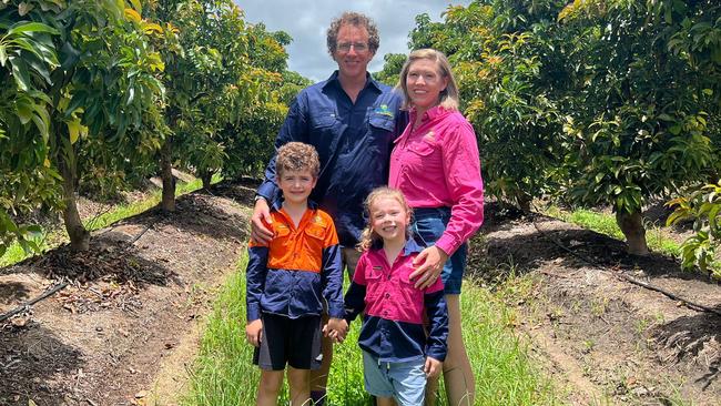 Andrew and Lisa Fyffe, with children Hugo and Evelyn, run Dandy Produce near Bundaberg. They say the current price of avocados offers great value for consumers. Photo: Supplied