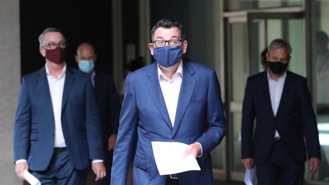 Victorian Premier Daniel Andrews, flanked by Health Minister Martin Foley, left, and Chief Health Officer Brett Sutton, right, delivers the lockdown news. Picture: NCA NewsWire/ David Crosling