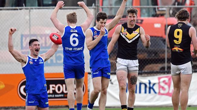 St Peters players celebrate winning the division two grand final as the siren sounds last Saturday. Picture: Tom Huntley