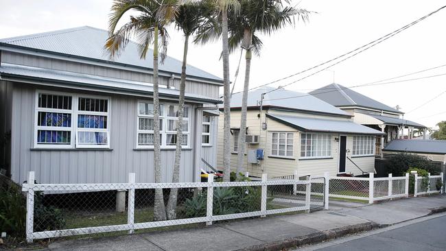 The house at 48 Abingdon St, Woolloongabba (left), at the centre of the controversy.