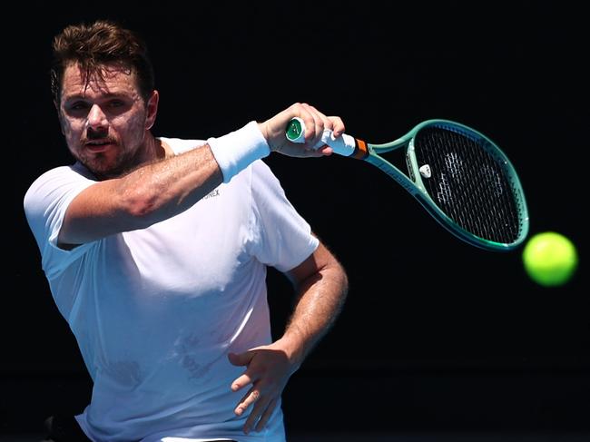 MELBOURNE, AUSTRALIA - JANUARY 06: Stan Wawrinka of Switzerland plays a forehand during a training session ahead of the 2024 Australian Open at Melbourne Park on January 06, 2024 in Melbourne, Australia. (Photo by Graham Denholm/Getty Images)