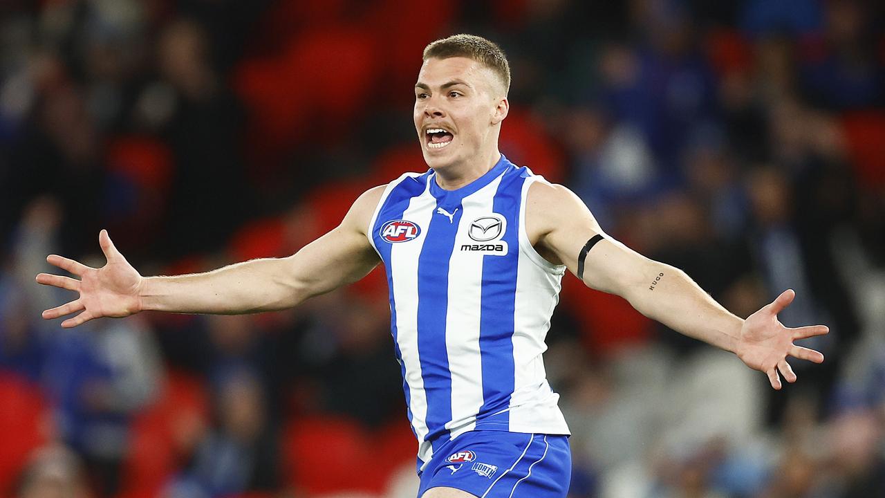 Cameron Zurhaar celebrates his matchwinning goal in the final three minutes of the Roos’ victory over Richmond. Picture: Getty Images