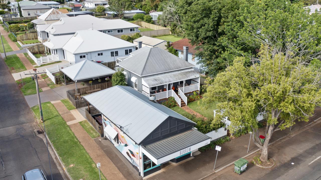 SOLD: The popular Burrow Cafe and a dwelling to the rear of it on Bridge Street in Mount Lofty have been snapped up by a family for more than $1m, in a situation described as horizontal shoptop living.