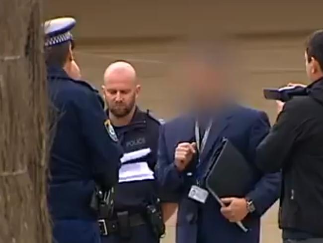 Officers outside the house. Picture: Seven News