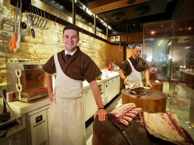 Head butcher Micky Peacock at work with butcher Dylan Carasco at Victor Churchill. Picture: Liam Driver