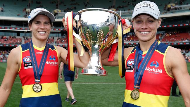 Crows co-captains Chelsea Randall (left) and Erin Phillips celebrate after helping Adelaide beat Carlton in the 2019 AFLW grand final. Both Randall and Phillips have suffered ACL injuries. Picture: Michael Willson/AFL Photos