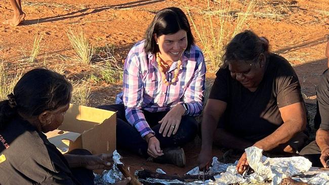 Chief Minister Natasha Fyles celebrating the opening of the cross with locals at Haasts Bluff.