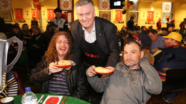 Collingwood president Eddie McGuire serving food at the Salvation Army’s Bourke St cafe. Picture: Michael Klein