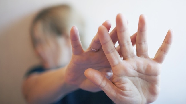 A young woman protects herself by hand Photo: iStock